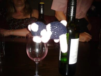 Tally drinking from a wine glass