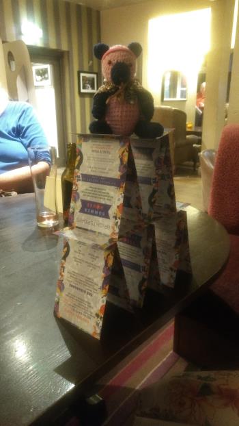 Sam on top of a house of cards