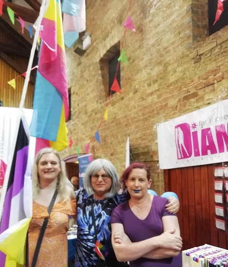 Gem, Lauren and Heather by the flag pole