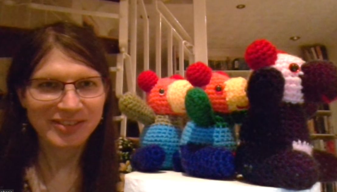 Three pandas in a line