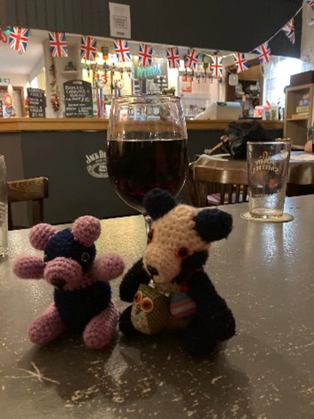 Pandas with a glass of wine and jubilee flags