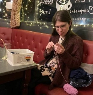 Stephanie crocheting a panda