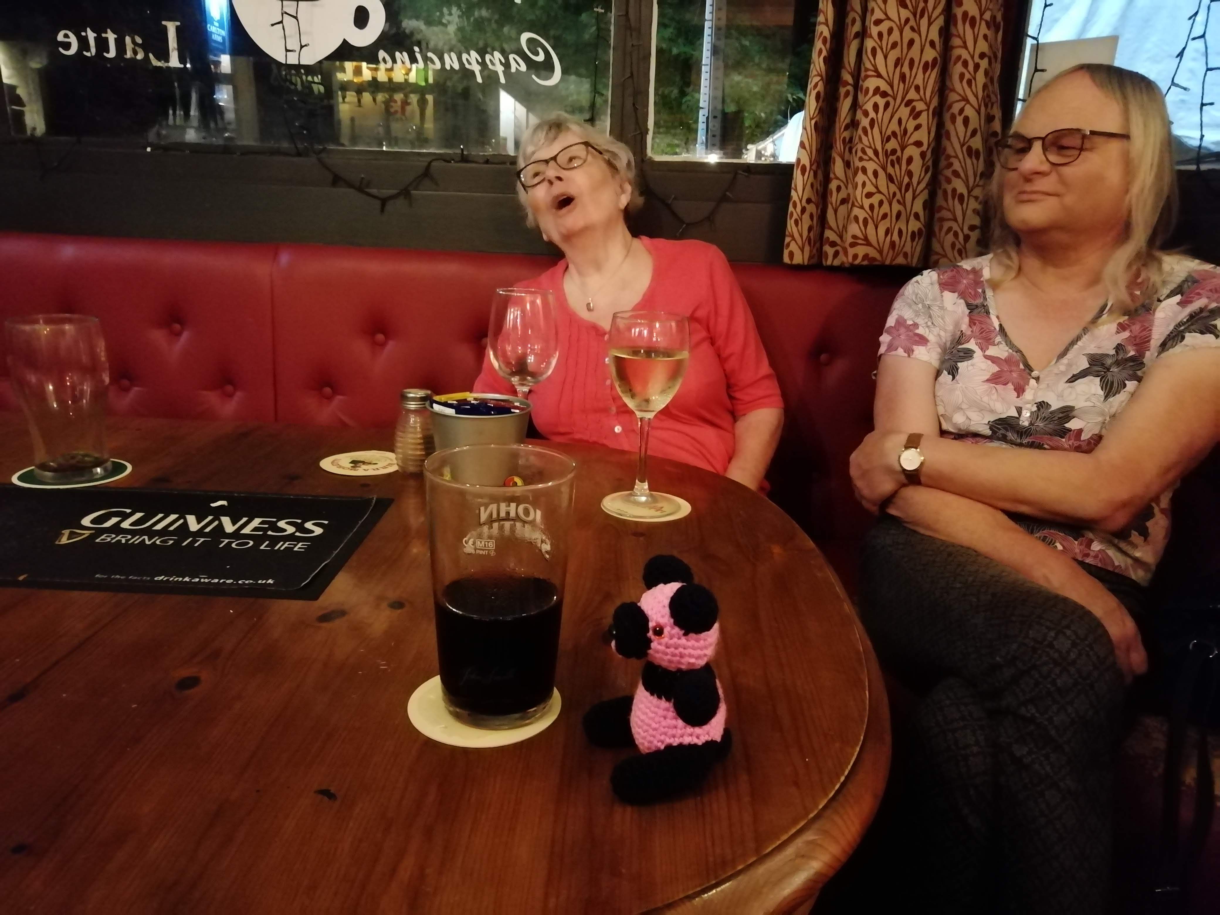 Two Diamonds at a table with drinks