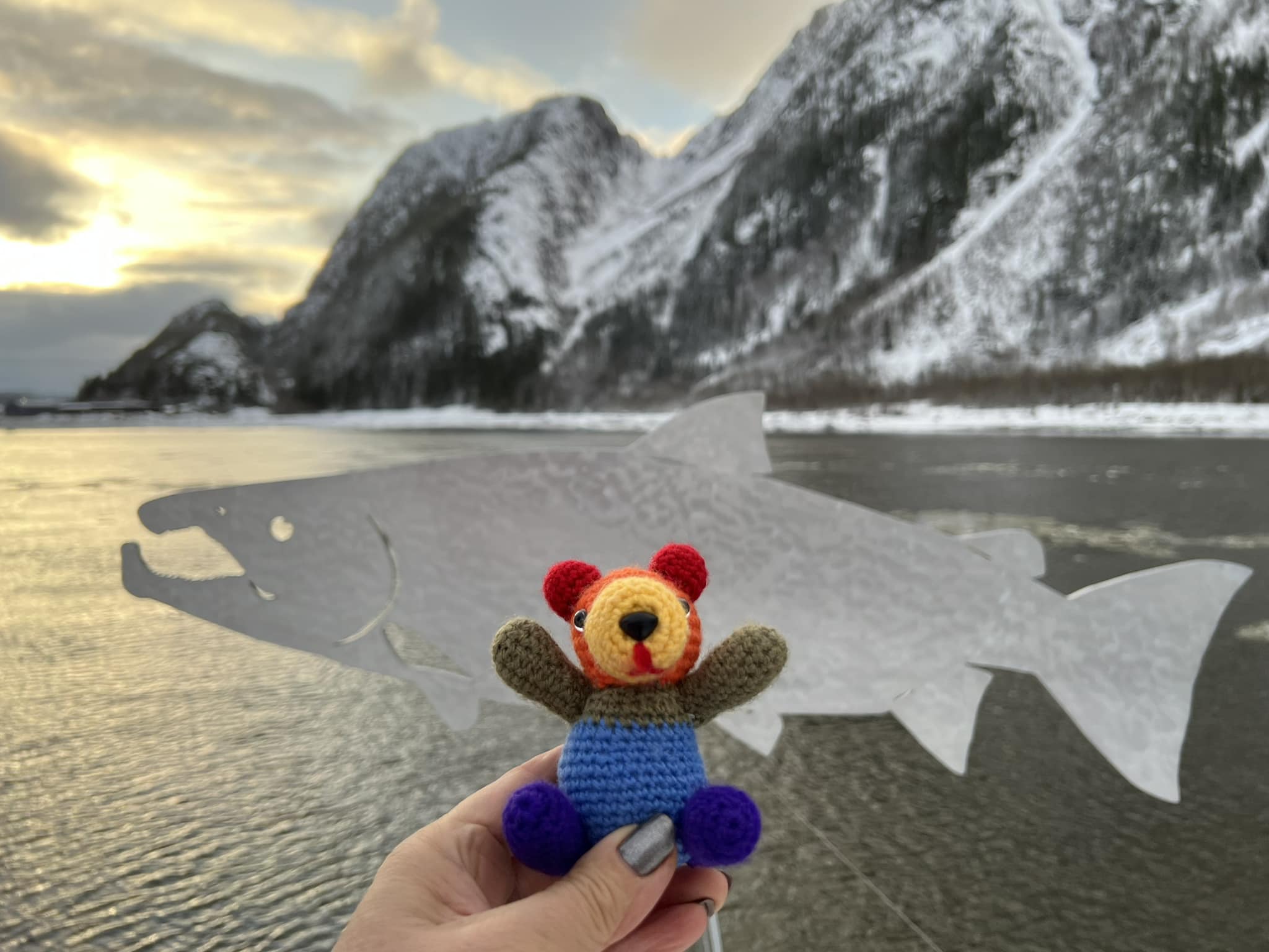 Panda Aoura in front of a lake